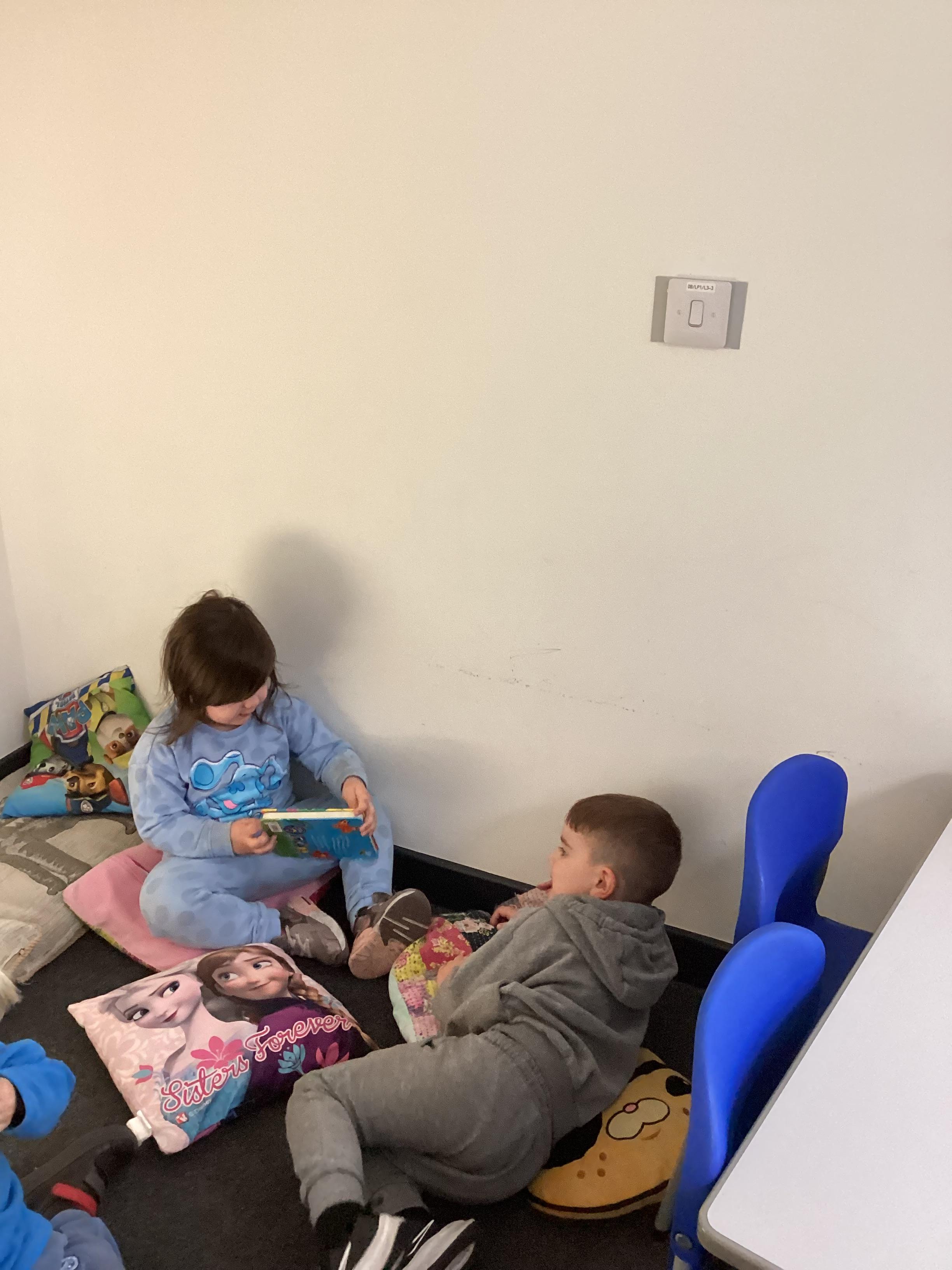 Having a great time role playing reading to a friend