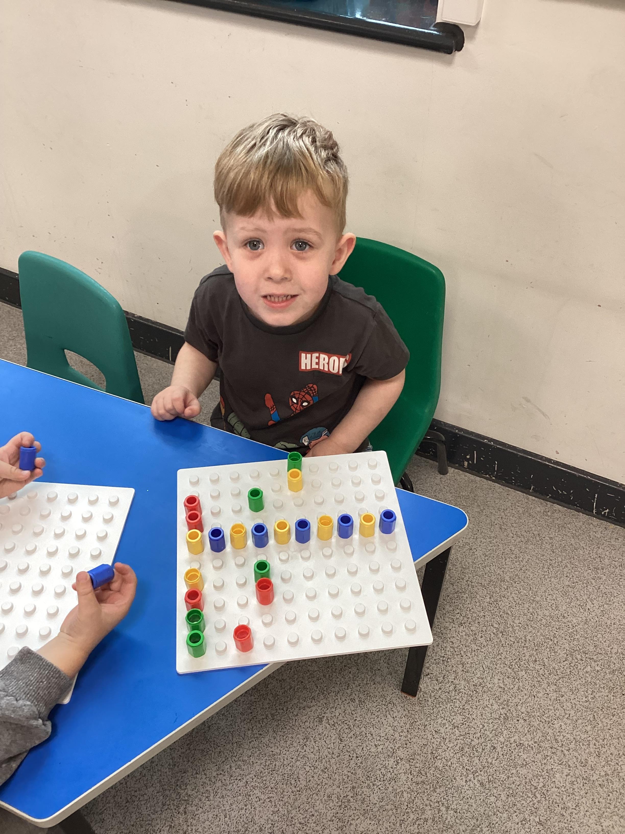 I used the numicon pegs to make my own colour pattern.